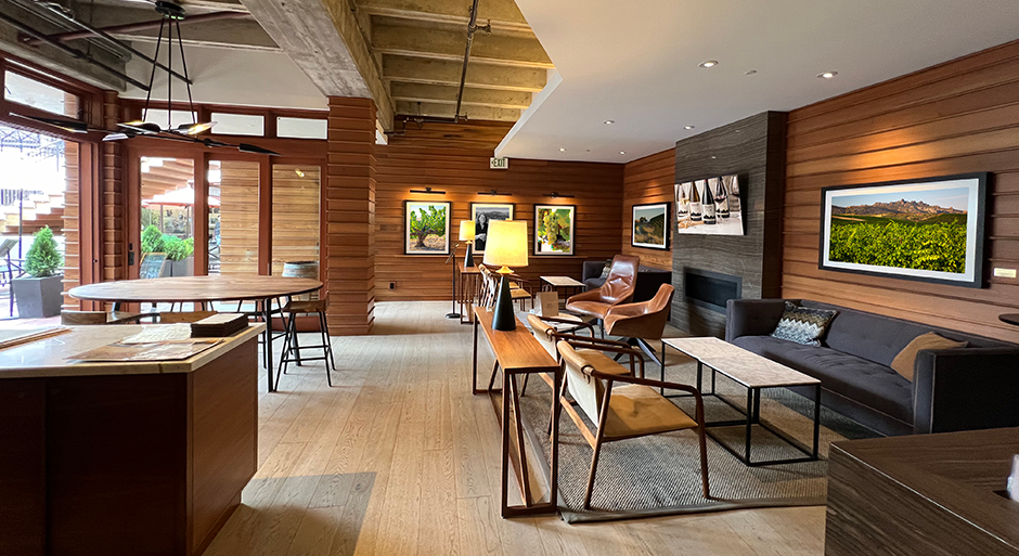 Interior of the Chalone tasting room with warm wood-paneled walls and cozy seating.